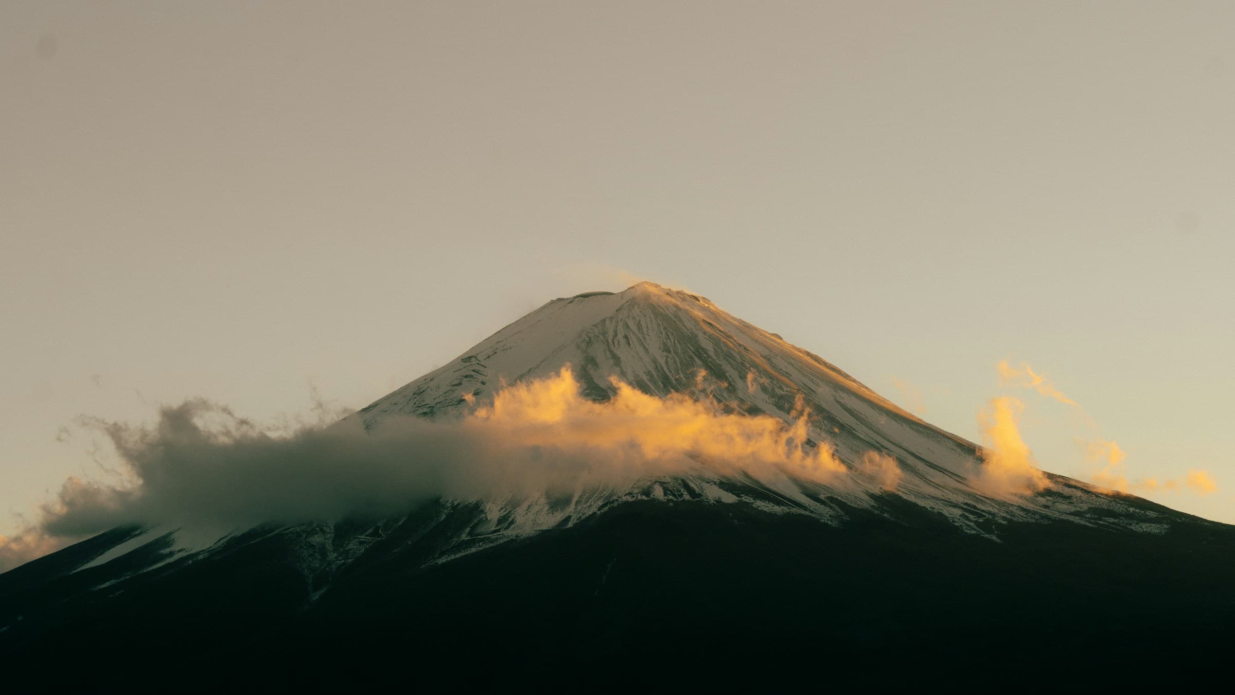 Mount Fuji rising beyond Chureito Pagoda and cherry blossoms in Japan