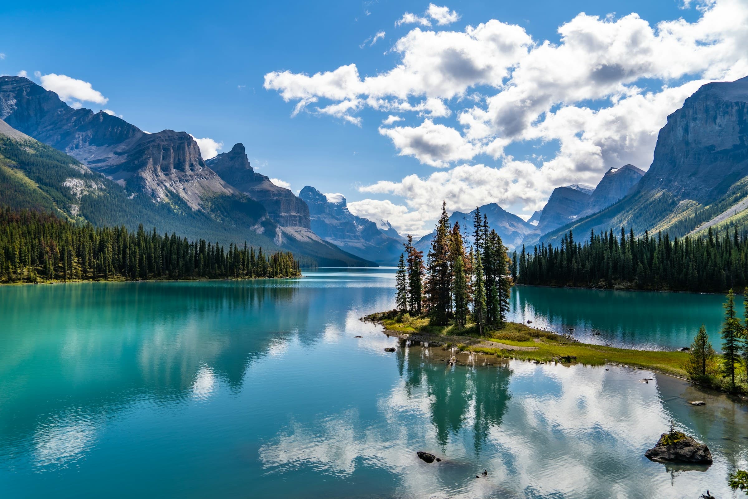 Maligne Lake framed by forested peaks in Jasper National Park, Alberta, Canada